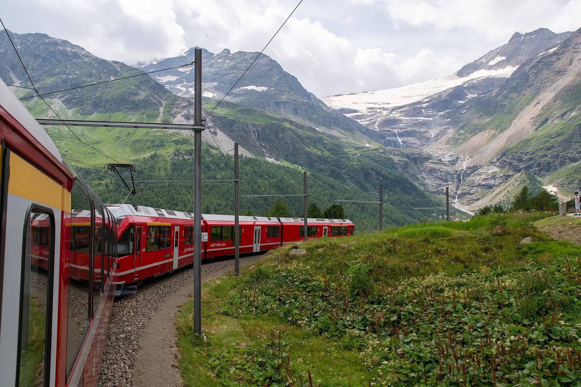 The view from a Bernina Express window near Alp Grüm, looking up at the Palü glacier.